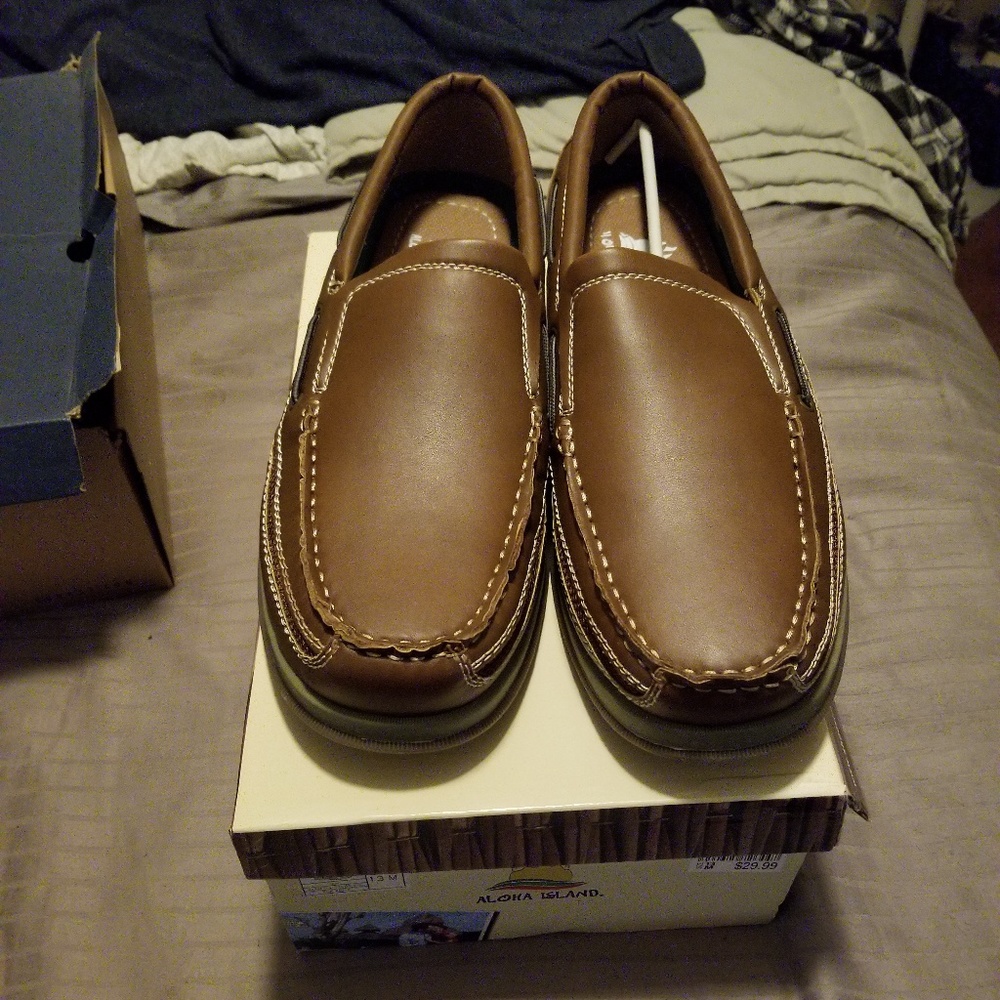 Men's new, never worn slip on shoes. Size 13M
